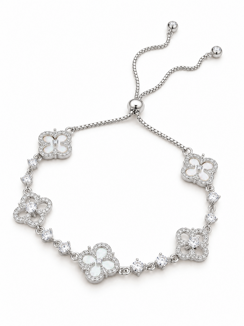 Blooming Clover Charm Bracelet featuring clover blossom charms accented with sparkling stones and an adjustable slider clasp.