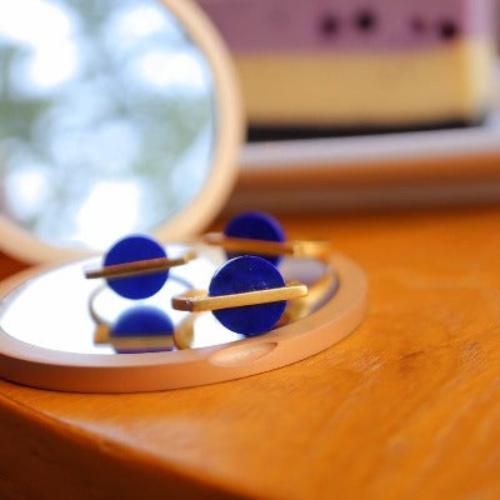 Modernist Lapis Lazuli Ring featuring a round genuine lapis lazuli gemstone accented by a sleek gold vermeil bar on an adjustable band.