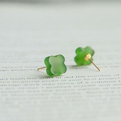 Lucky Clover Hetian Jade Ear Studs featuring genuine green Hetian jade carved into a four-leaf clover design with 18K gold findings.