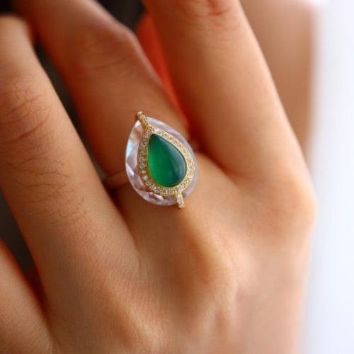 Regal Green Onyx Teardrop Ring featuring a genuine green onyx gemstone in a teardrop shape surrounded by clear crystal accents on an adjustable sterling silver band.