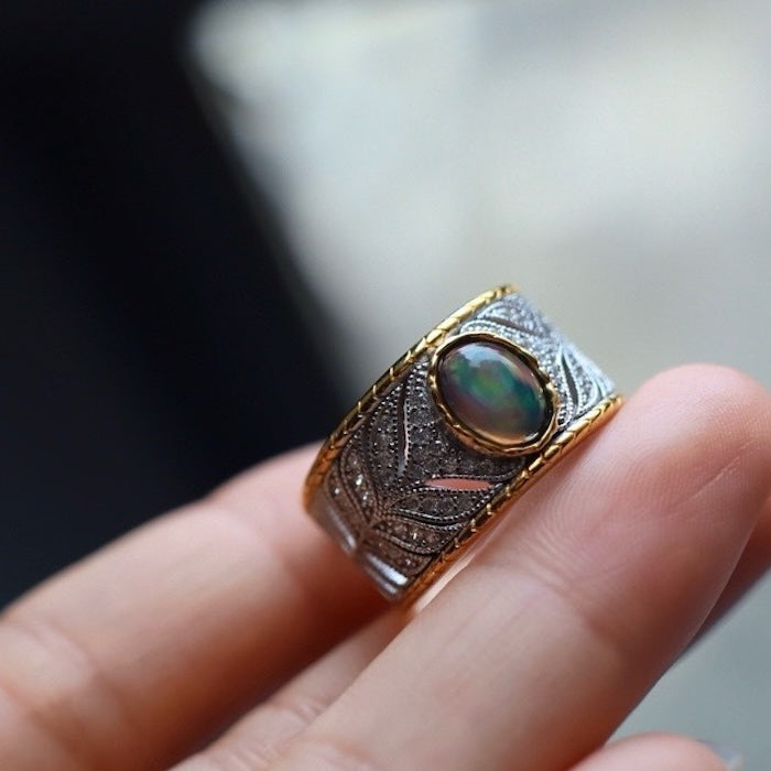 Midnight Opal Signet Ring featuring a genuine black opal gemstone set within an intricately detailed gold vermeil adjustable band.