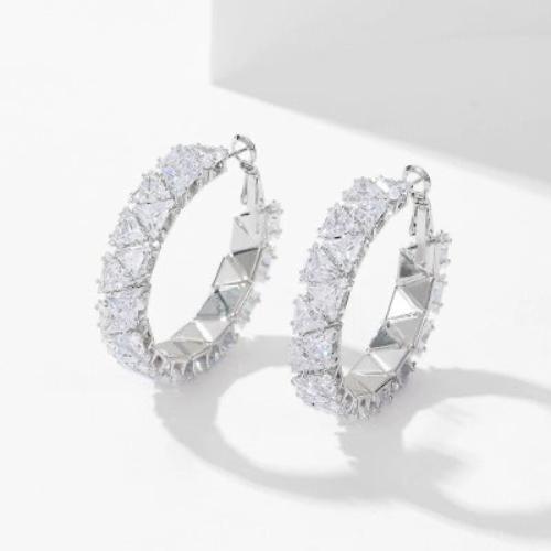 Bold Luminous Pavé Hoop Earrings featuring a chunky hoop silhouette with a continuous pavé setting in gold-plated or silver-plated brass.