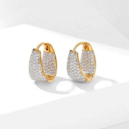 Pavé Crystal Huggie Hoop Earrings featuring sparkling pavé-set zirconia crystals on a refined gold-plated huggie hoop design.