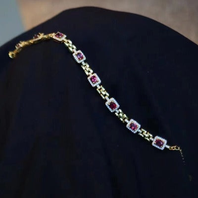 Venetian Garnet Link Bracelet featuring genuine red garnet gemstones set within geometric gold vermeil links in an elegant vintage-inspired bracelet design.