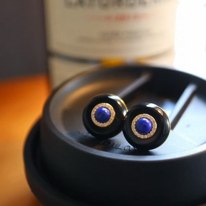 Vintage Black Onyx Halo Ear Studs featuring polished black onyx, a choice of lapis lazuli or green onyx center stones, and sparkling halo accents in a gold vermeil setting.