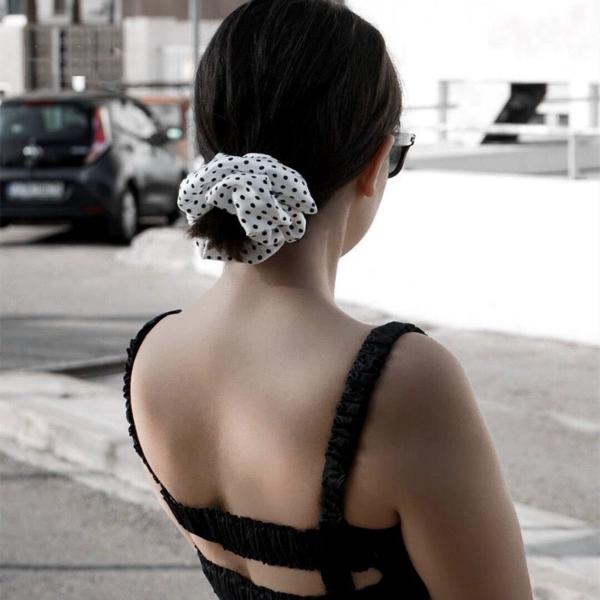 Classic Polka Dot Silk Hair Scrunchie crafted from 100% 19 momme mulberry silk, available in emerald green, black, chocolate brown, and white.