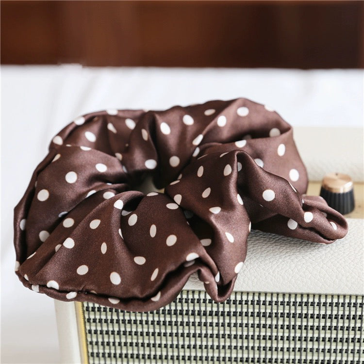 Classic Polka Dot Silk Hair Scrunchie crafted from 100% 19 momme mulberry silk, available in emerald green, black, chocolate brown, and white.