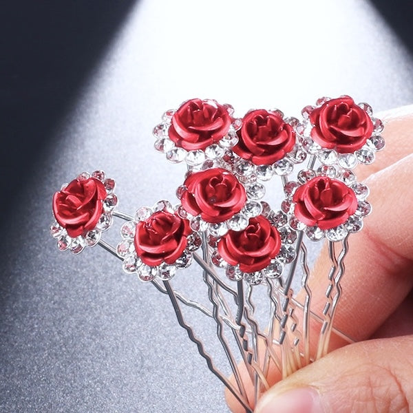 Scarlet Rose Bridal Hair Pins featuring red rose motifs surrounded by crystal accents on silver-tone hair pins, sold as a set of 8.
