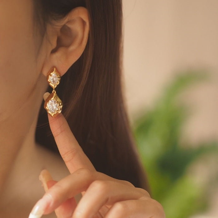 Molten Gold Crystal Drop Earrings featuring sparkling faceted zirconia crystals set within an organic textured gold-plated drop earring design.