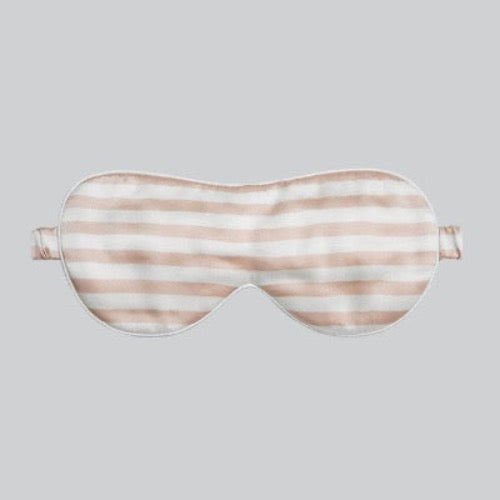 Oversized 100% silk sleep mask in striped patterns crafted from 19 momme silk for enhanced light blockage and comfortable sleep.