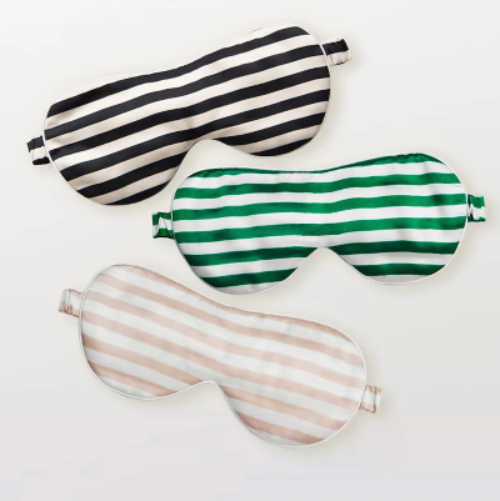Oversized 100% silk sleep mask in striped patterns crafted from 19 momme silk for enhanced light blockage and comfortable sleep.