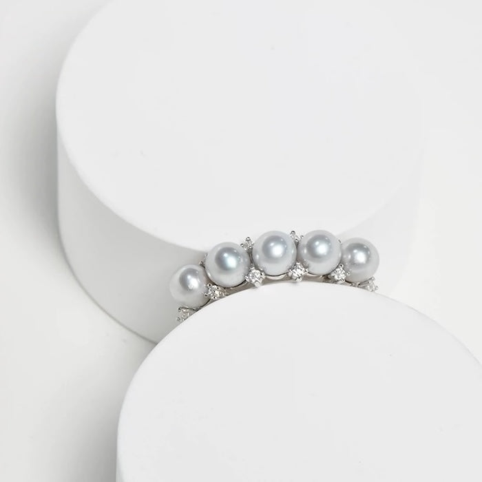 Pearl Tiara Ring featuring genuine freshwater pearls accented with sparkling zirconia on a gold vermeil or sterling silver adjustable band.