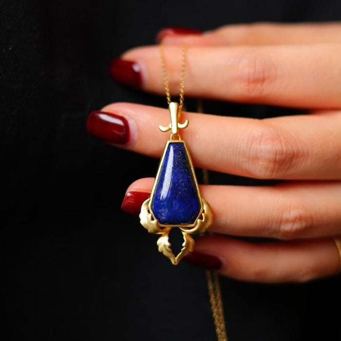 Royal Crest Shield Lapis Lazuli Pendant Necklace featuring a genuine deep-blue lapis lazuli stone set within an ornate gold vermeil shield-shaped pendant.