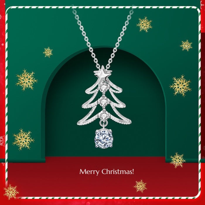 Dazzling Moissanite Christmas Tree Necklace featuring a Christmas tree pendant with sparkling moissanite accents and a 0.5 ct center stone, measuring 23 × 15 mm.