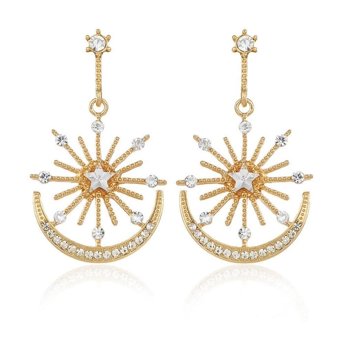 Celestial Moon & Star Drop Earrings featuring radiant starburst details, sparkling crystal accents, pearl embellishments, and a crescent moon silhouette in gold or silver plating.