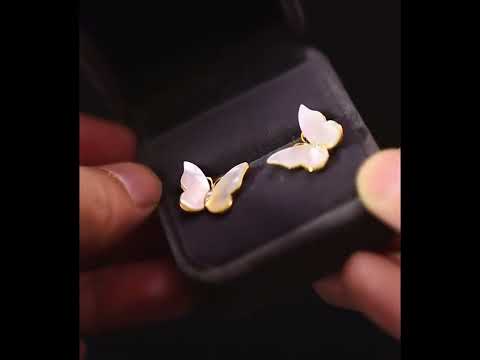 Iridescent Butterfly Shell Stud Earrings featuring luminous shell wings and delicate zirconia accents in a butterfly-inspired gold-tone design.