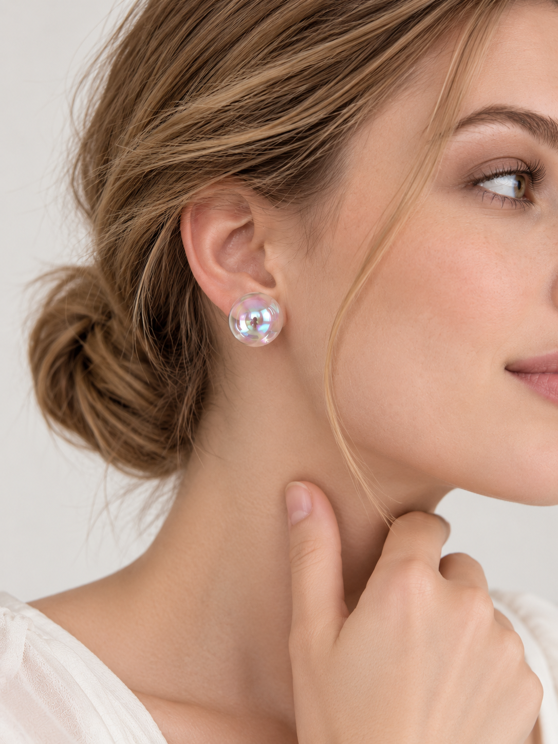 Iridescent Aurora Crystal Orb Stud Earrings with luminous rainbow reflections and polished round design.