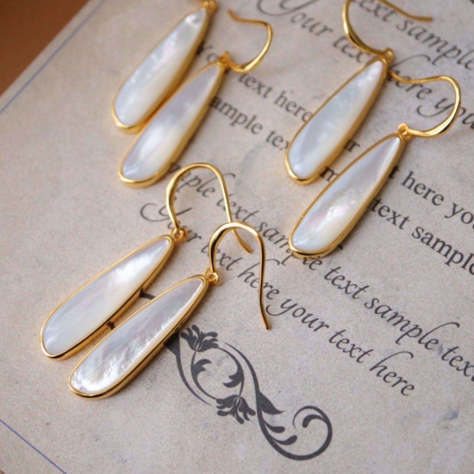 Sculptural Lumière Mother of Pearl Earrings crafted with genuine mother of pearl in gold vermeil.