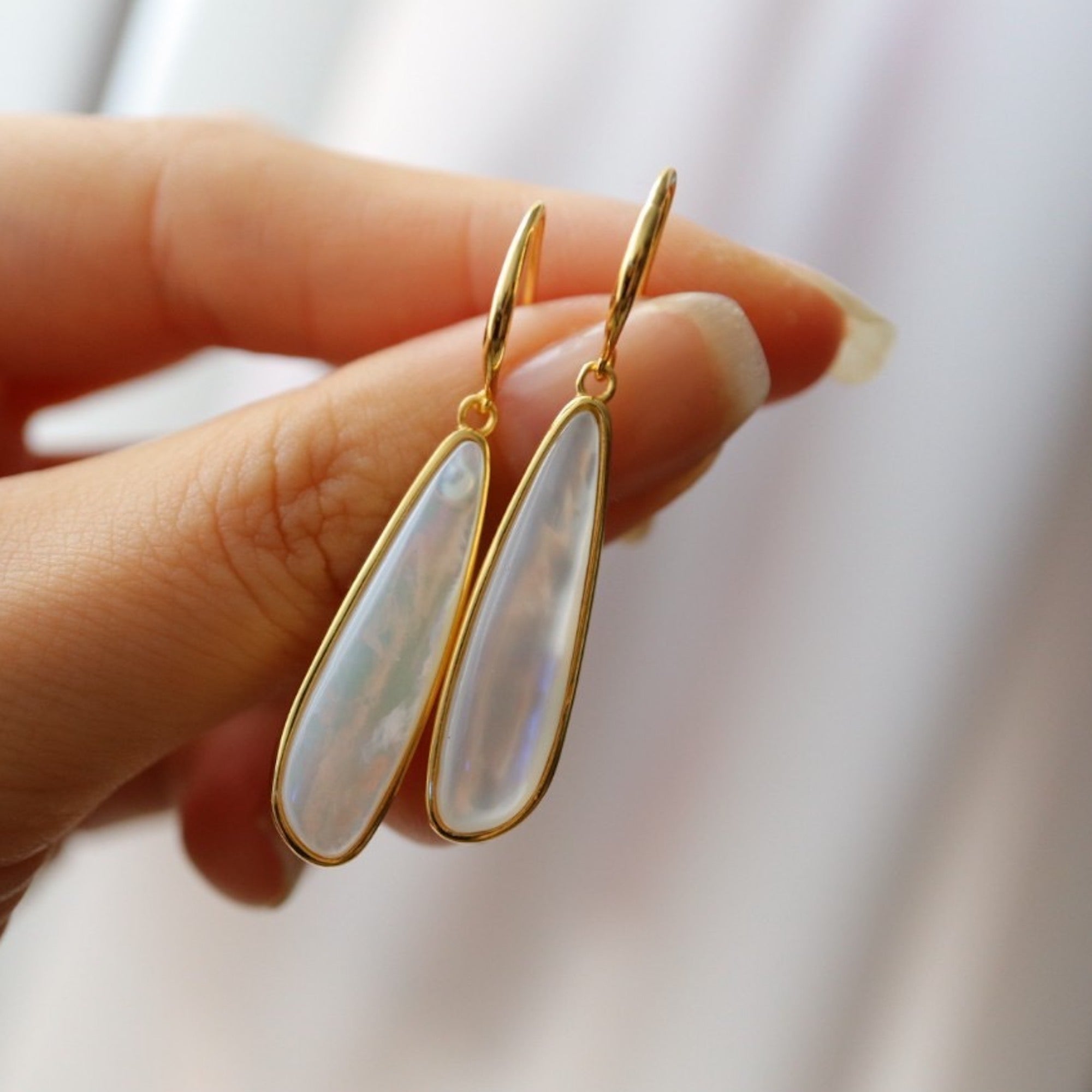 Sculptural Lumière Mother of Pearl Earrings crafted with genuine mother of pearl in gold vermeil.
