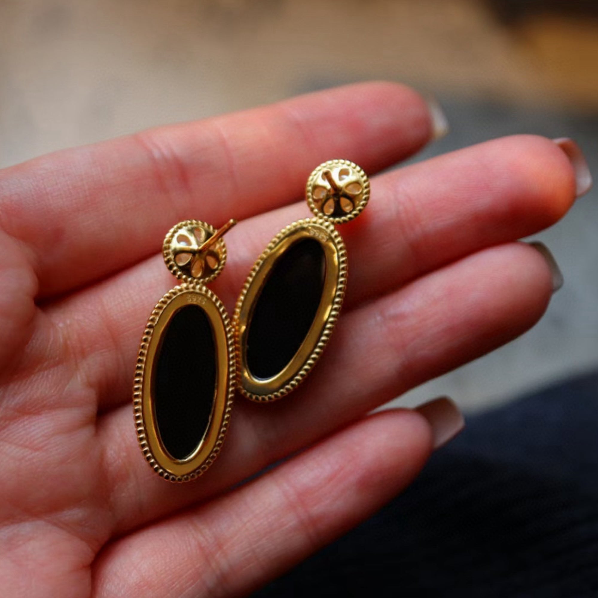 Heirloom black onyx pearl drop earrings crafted with genuine black onyx, freshwater pearls and gold vermeil.