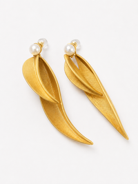 Golden cascading leaf earrings with layered curved leaves and white pearl studs.