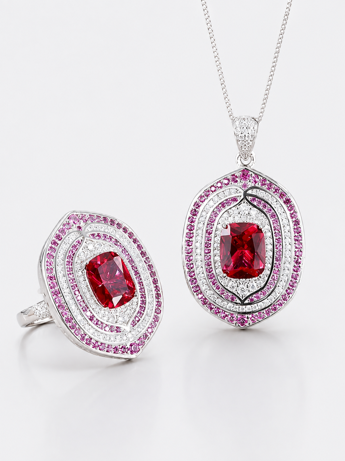 Royal Ruby Halo Crystal Pendant with vivid red centre and layered pink and clear sparkling halos.
