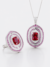Royal Ruby Halo Crystal Pendant with vivid red centre and layered pink and clear sparkling halos.
