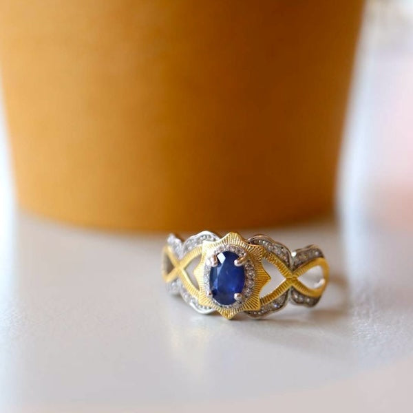 Vintage Royal Sapphire Crown Ring featuring a genuine blue sapphire stone set within an ornate gold vermeil and sterling silver adjustable band.