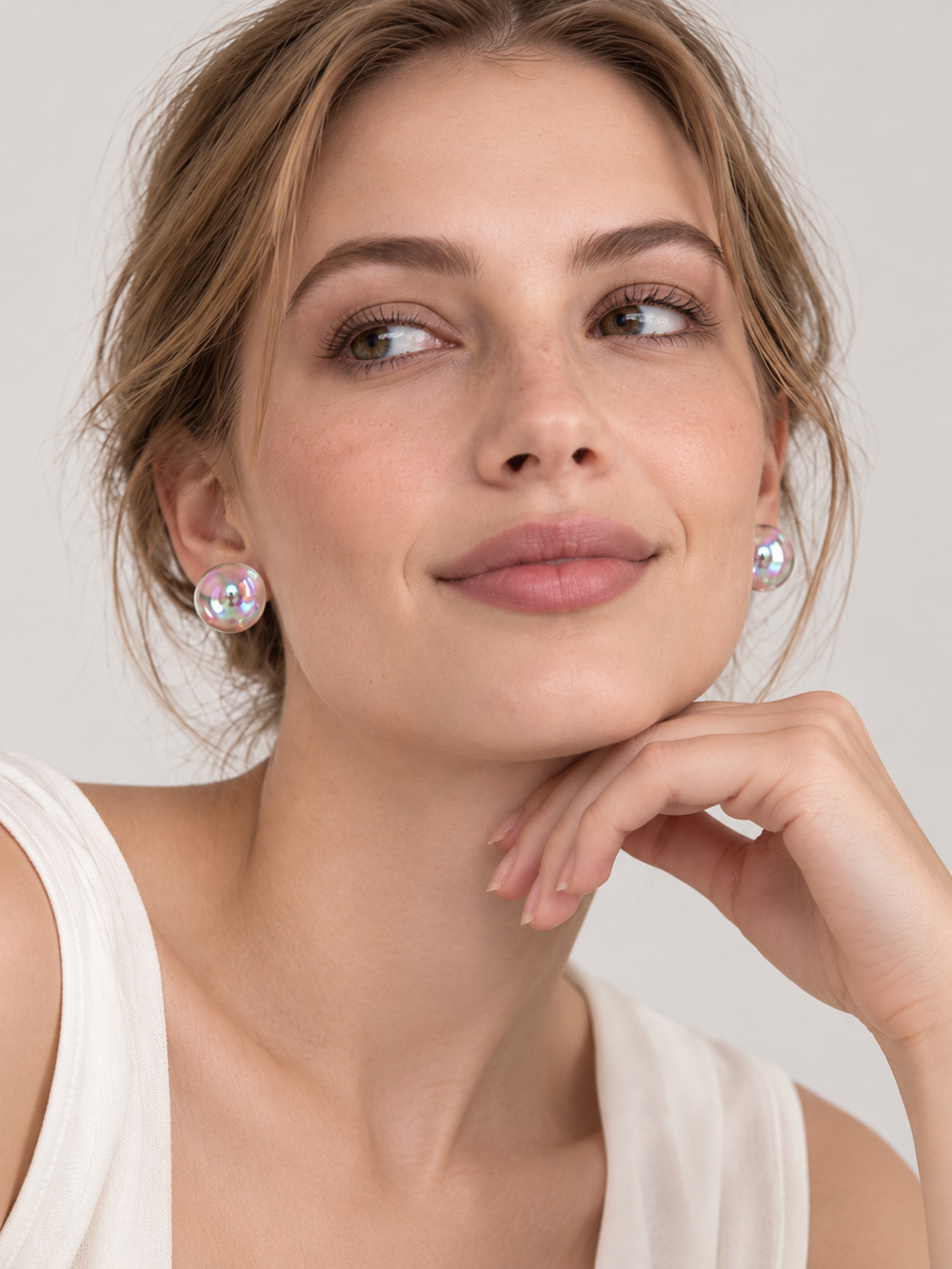 Iridescent Aurora Crystal Orb Stud Earrings with luminous rainbow reflections and polished round design.