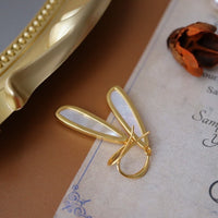 Sculptural Lumière Mother of Pearl Earrings crafted with genuine mother of pearl in gold vermeil.