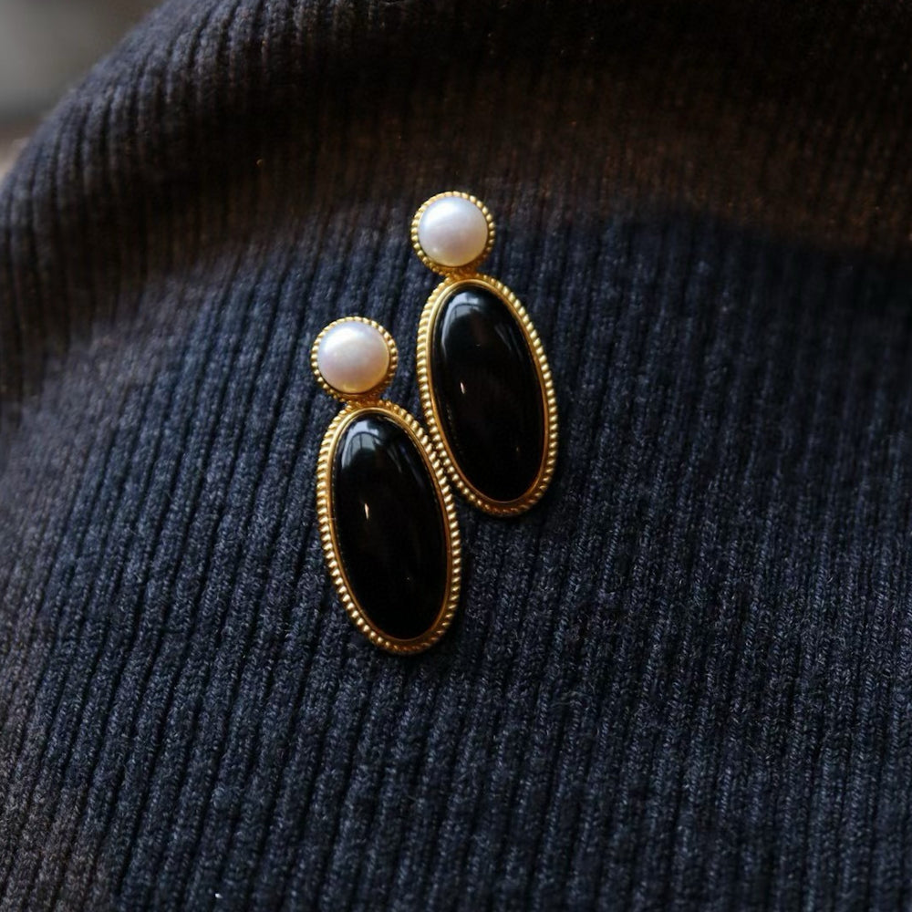 Heirloom black onyx pearl drop earrings crafted with genuine black onyx, freshwater pearls and gold vermeil.