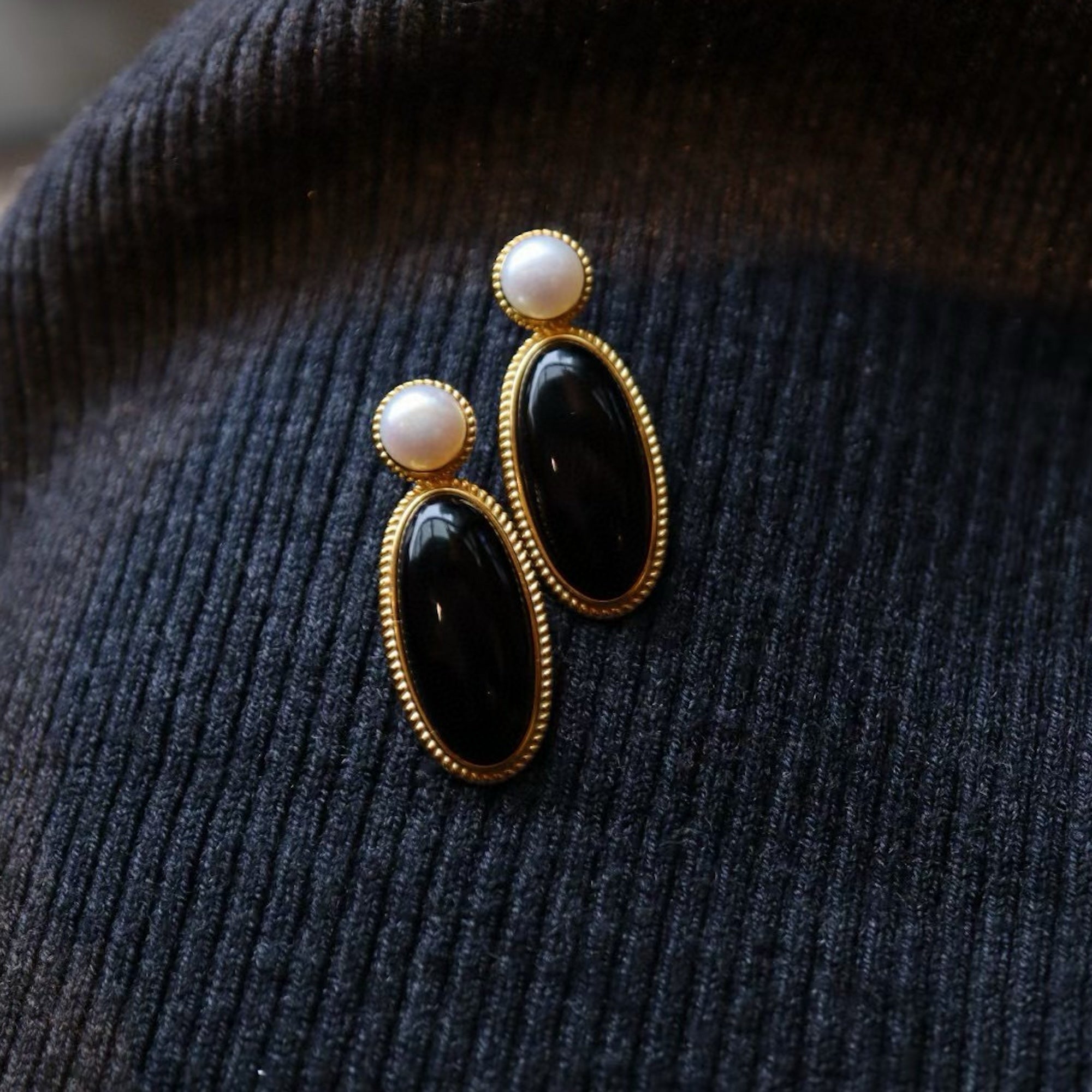 Heirloom black onyx pearl drop earrings crafted with genuine black onyx, freshwater pearls and gold vermeil.