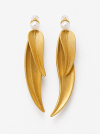 Golden cascading leaf earrings with layered curved leaves and white pearl studs.