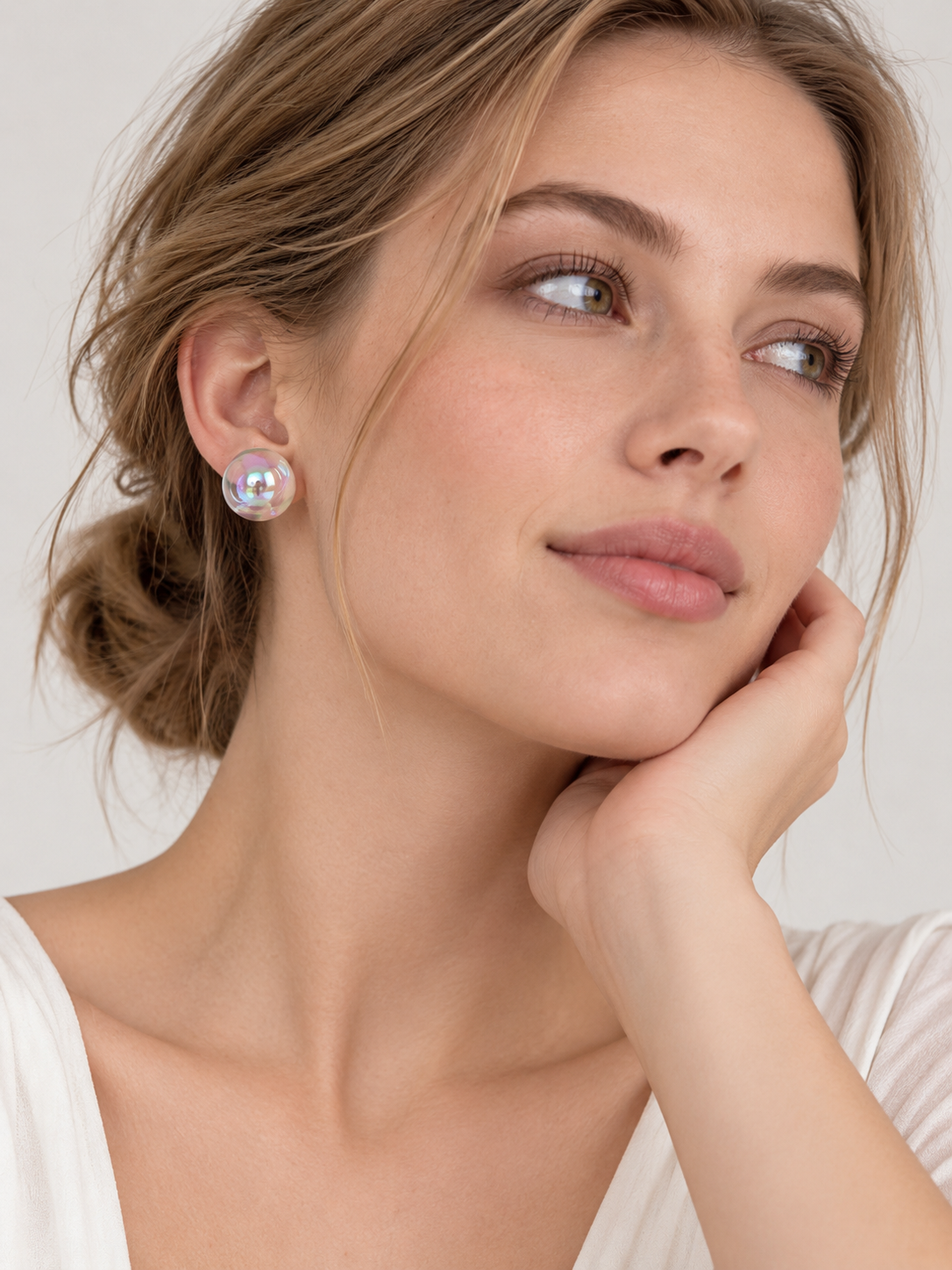 Iridescent Aurora Crystal Orb Stud Earrings with luminous rainbow reflections and polished round design.