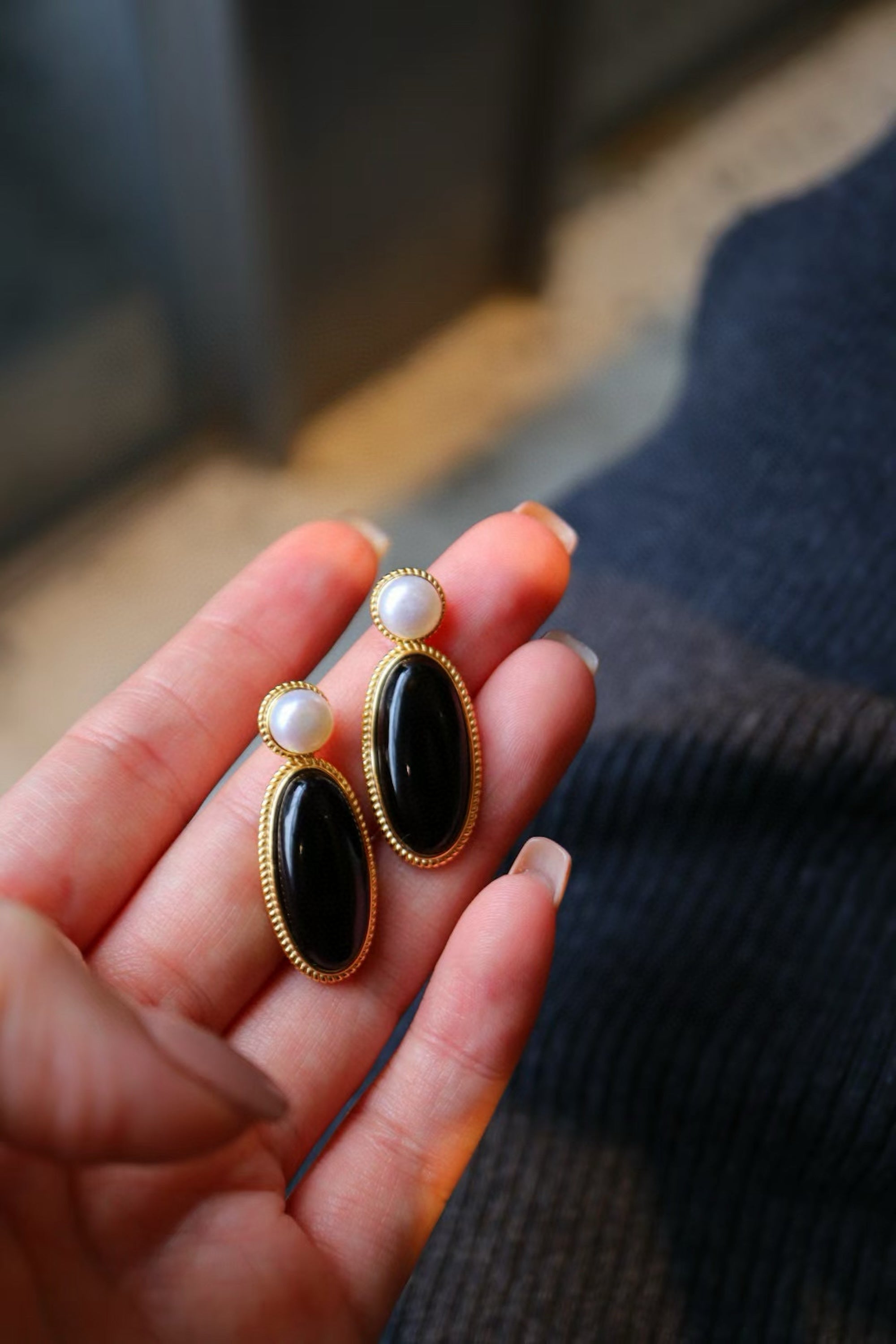 Heirloom black onyx pearl drop earrings crafted with genuine black onyx, freshwater pearls and gold vermeil.