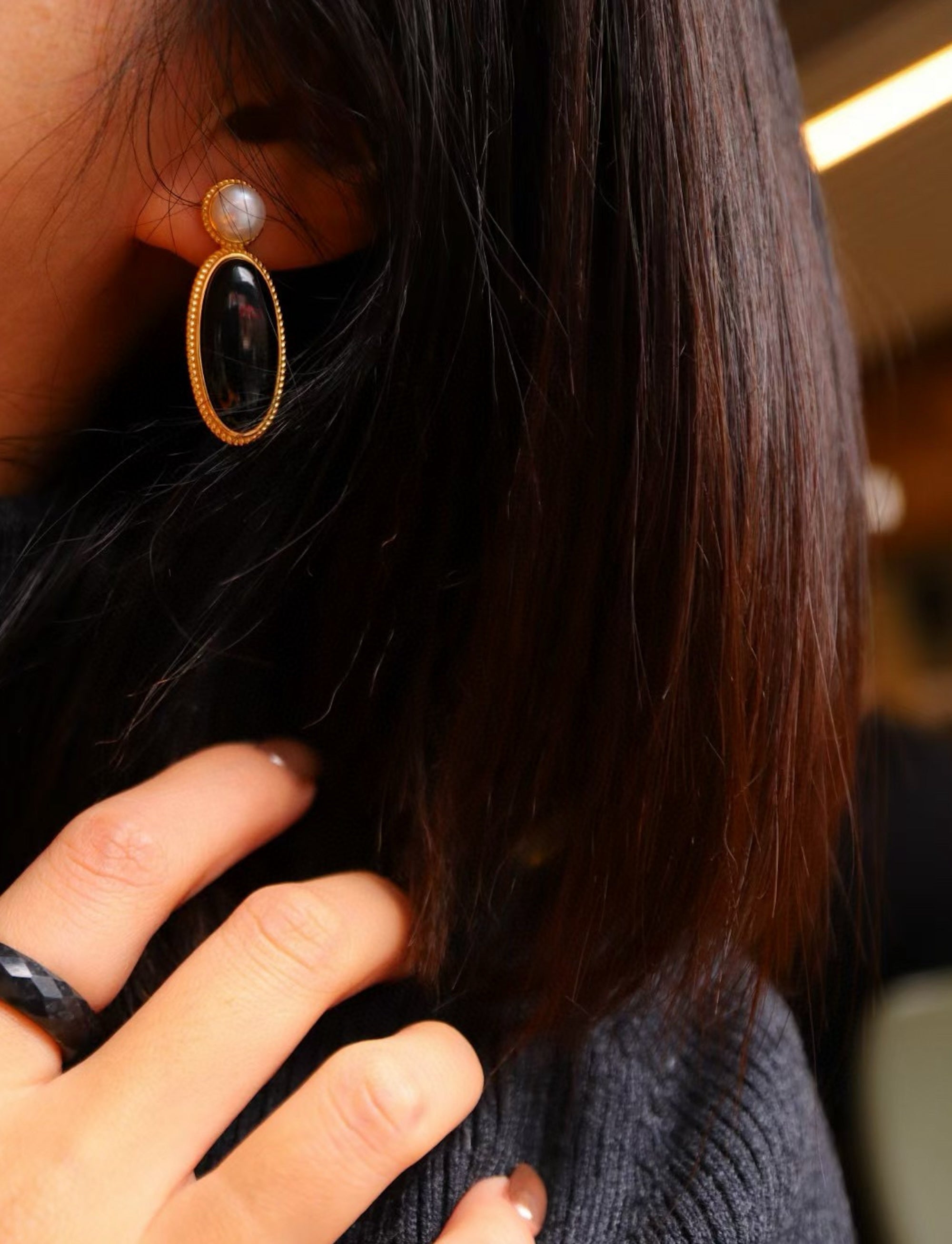 Heirloom black onyx pearl drop earrings crafted with genuine black onyx, freshwater pearls and gold vermeil.
