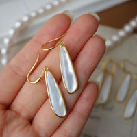 Sculptural Lumière Mother of Pearl Earrings crafted with genuine mother of pearl in gold vermeil.