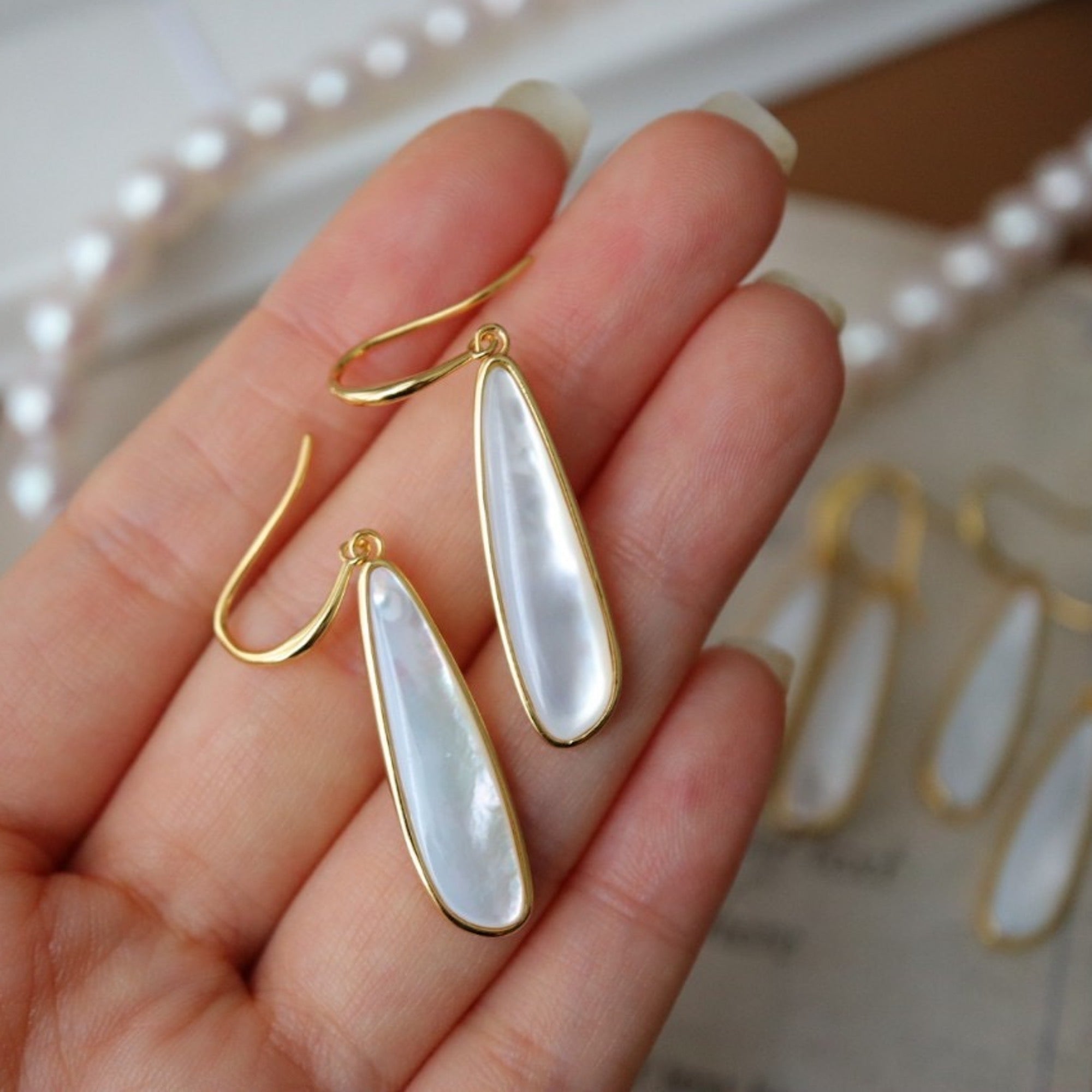 Sculptural Lumière Mother of Pearl Earrings crafted with genuine mother of pearl in gold vermeil.