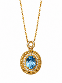 Heirloom Blue Topaz Pendant Necklace featuring an oval genuine blue topaz gemstone surrounded by ornate gold vermeil detailing and delicate sparkling accents.