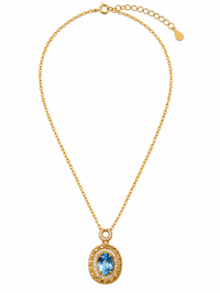 Heirloom Blue Topaz Pendant Necklace featuring an oval genuine blue topaz gemstone surrounded by ornate gold vermeil detailing and delicate sparkling accents.