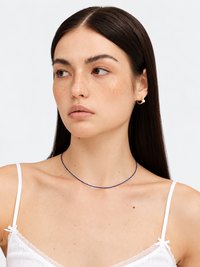 Lapis Lazuli Ultra Slim Necklace featuring delicate 1 mm genuine lapis lazuli beads in a minimalist royal-blue strand with gold-plated details.