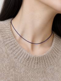Lapis Lazuli Ultra Slim Necklace featuring delicate 1 mm genuine lapis lazuli beads in a minimalist royal-blue strand with gold-plated details.