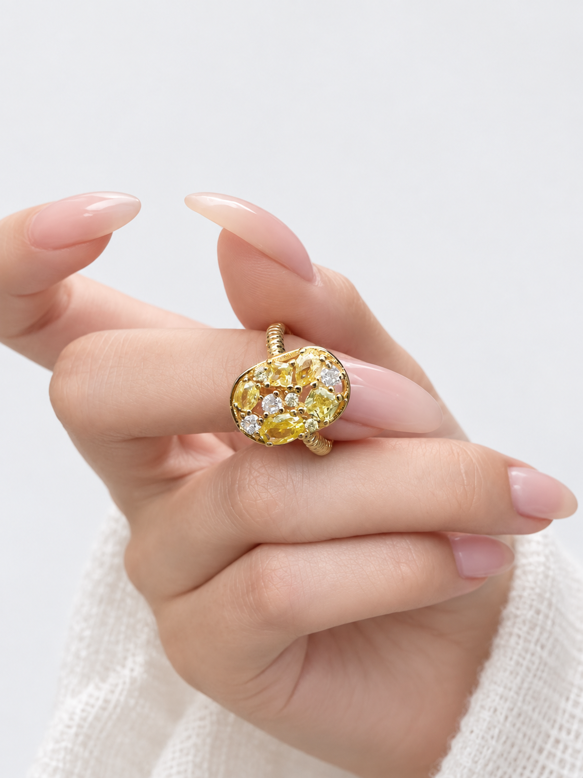 Yellow Crystal Cluster Open Ring featuring vibrant yellow zirconias and sparkling clear crystal accents in a gold-plated adjustable setting.
