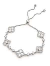 Blooming Clover Charm Bracelet featuring clover blossom charms accented with sparkling stones and an adjustable slider clasp.