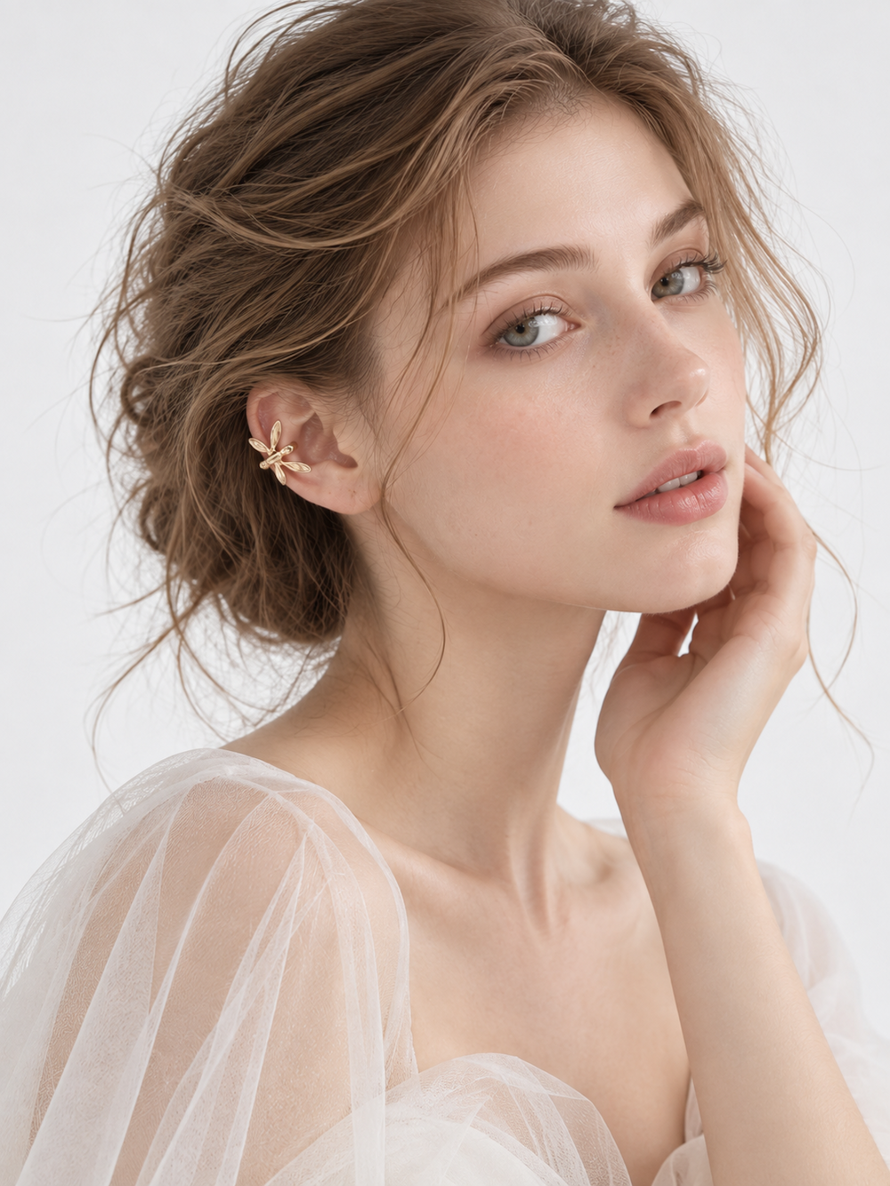 Dragonfly Wraparound Cartilage Ear Cuff with dimensional wings, available in gold and silver finishes.