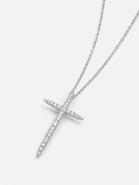 Refined tapered moissanite cross pendant necklace with elongated pointed design and delicate fine chain.