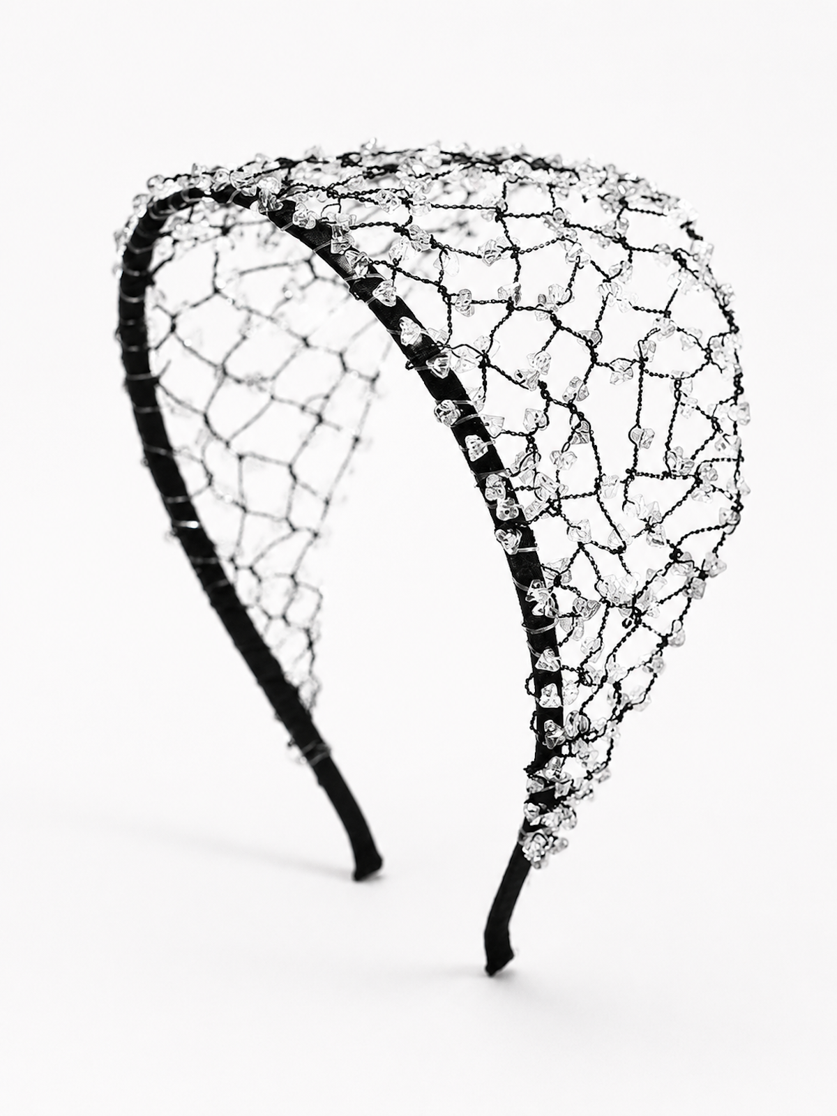 Wide black hairband with an intricate woven web design embellished with scattered clear crystal beads.