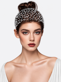 Wide black hairband with an intricate woven web design embellished with scattered clear crystal beads.