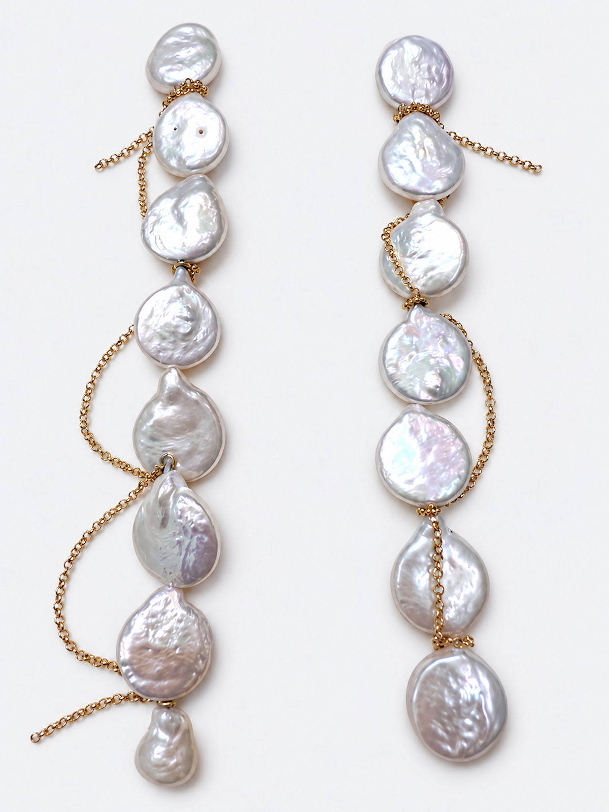Luminous Baroque Pearl Coin Beads Bracelet with irregular freshwater baroque pearls and delicate golden chain details.