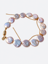 Luminous Baroque Pearl Coin Beads Bracelet with irregular freshwater baroque pearls and delicate golden chain details.